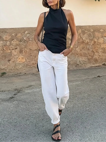 Casual black halter-neck tank top and white trousers set